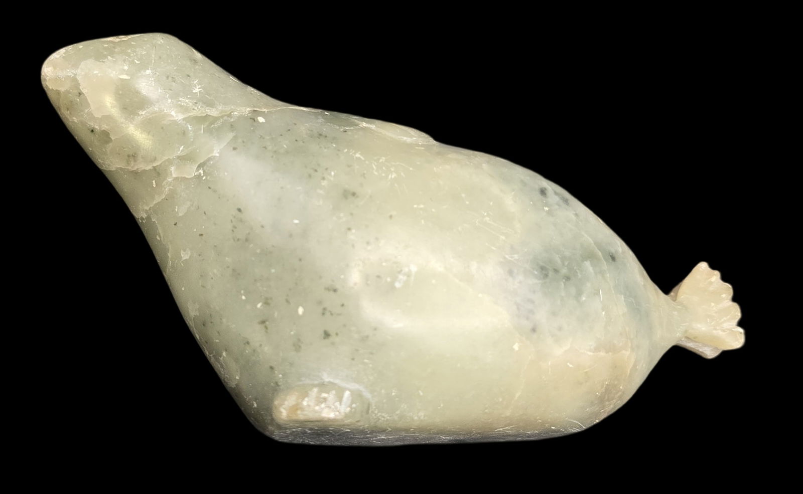 Vintage Native Canadian Inuit Hand Carved Soapstone Seal Figurine: Very good vintage condition with minor wear according to age, please see pictures. No cracks or repairs. Measures approx. 3 1/2" high x 5" wide. Signed.