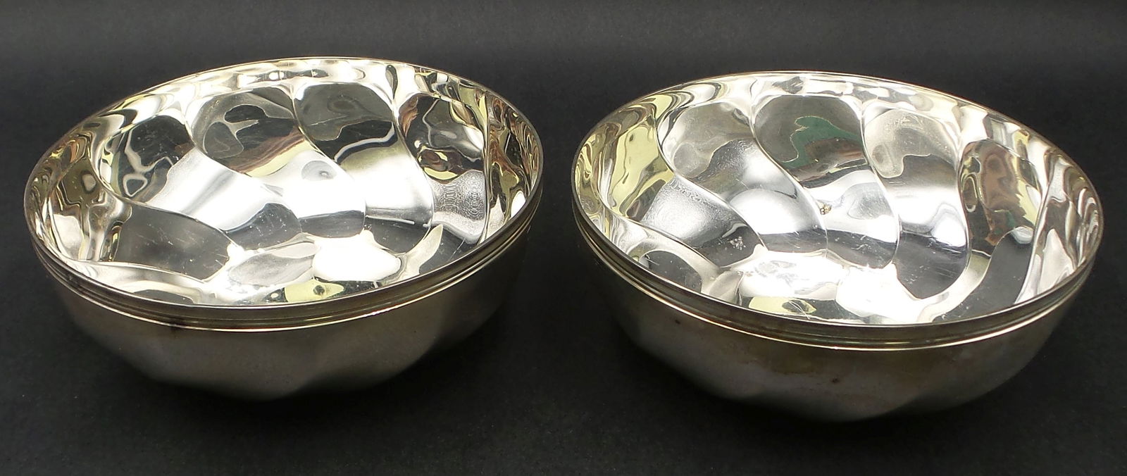 Pair of Vintage CHRISTOFLE Torsades Silverplate Swirl Bowls: Beautiful swirl design fitting for many occasions. Each measures approx. 4 1/2" in diameter. Very good vintage condition with minor wear according to age. Fully marked on the bottom.