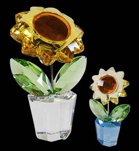 Pair of Vintage Retired SWAROVSKI Crystal Figurines - Sunflowers: Beautiful retired pieces in very good vintage condition; no chips, cracks, or repairs. Marked to underside. Measures approx. 4" high