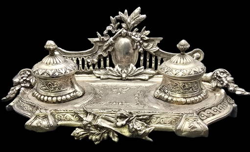 Antique Silvertone Cast Metal Inkwell: Very good antique condition; no chips, cracks, or repairs. Measures approx. 12 1/2" wide x 5" high.