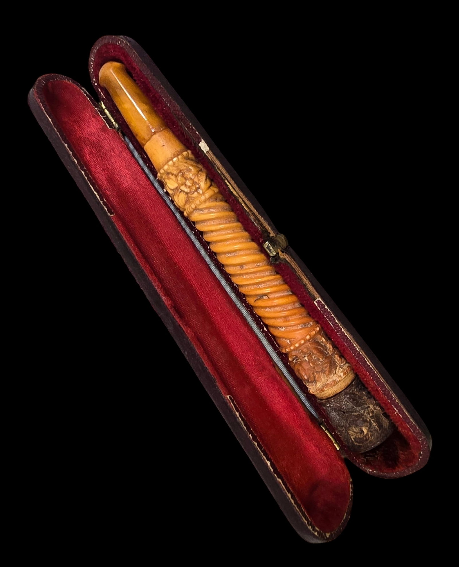 Antique European Hand Carved Meerschaum Cigarette Tip in Fitted Leather Case: Very good antique condition with wear and patina according to age. Measures approx. 5 1/2" long.