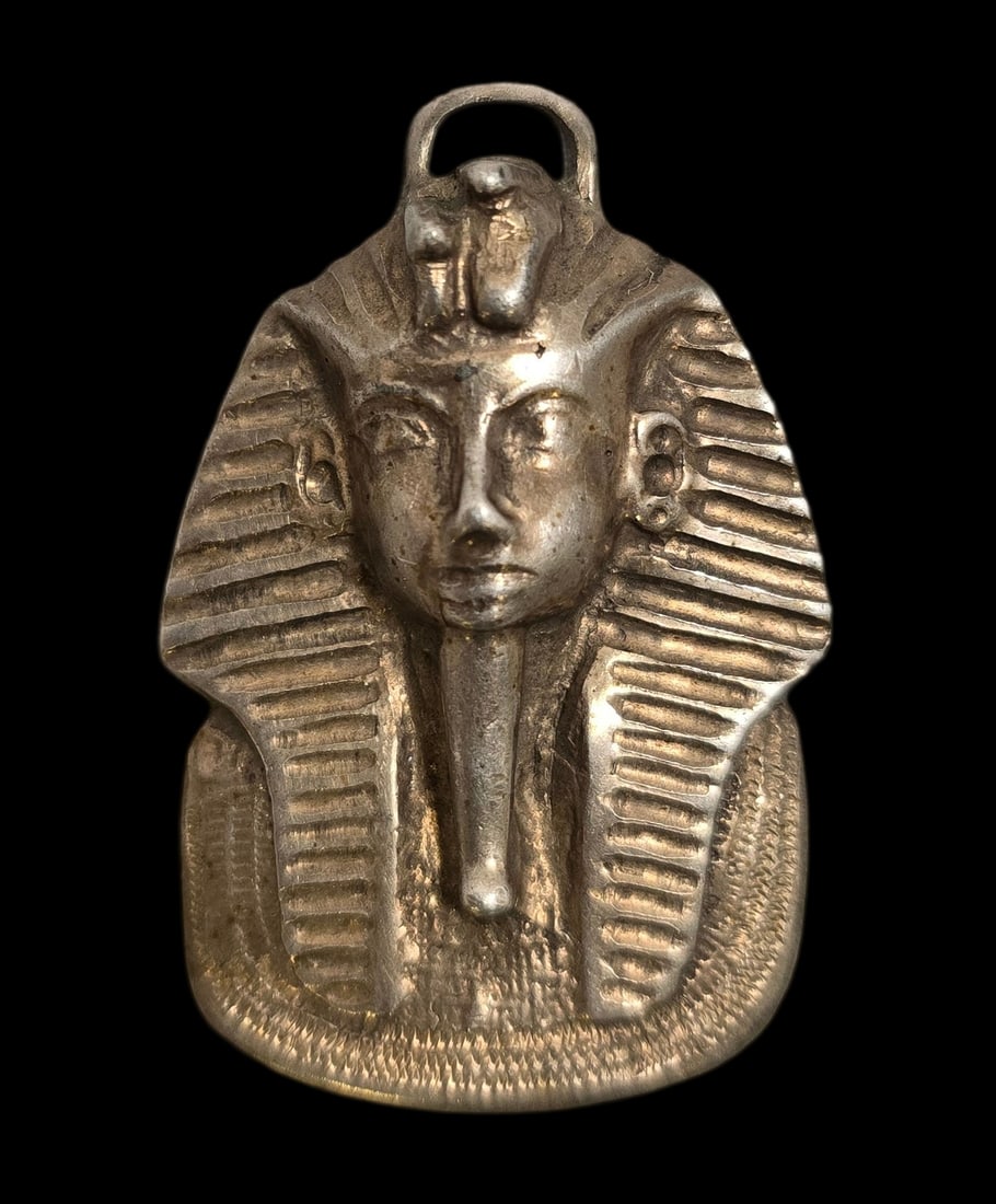 Very Large & Unusual Vintage Sterling Silver Egyptian Revival Mask Pendant: Very good vintage condition with some patina and wear according to age. Measures approx. 2" high x 1" wide and weighs ca. 21.7 grams. Tested for Sterling Silver. SHIPPING: We ship in-house and charge 