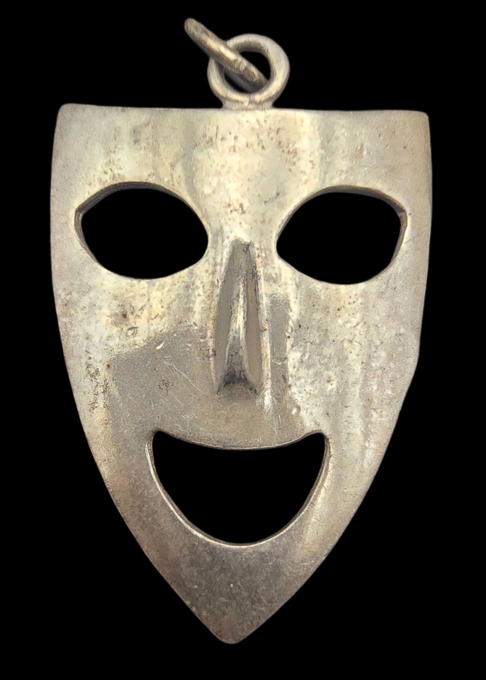 Vintage Sterling Silver Theater Mask Pendant: Very good vintage condition with some patina and wear according to age. Measures approx. 1 1/2" long and weighs ca. ca. 3.4 grams. Marked for Sterling Silver. SHIPPING: We ship in-house and charge a f