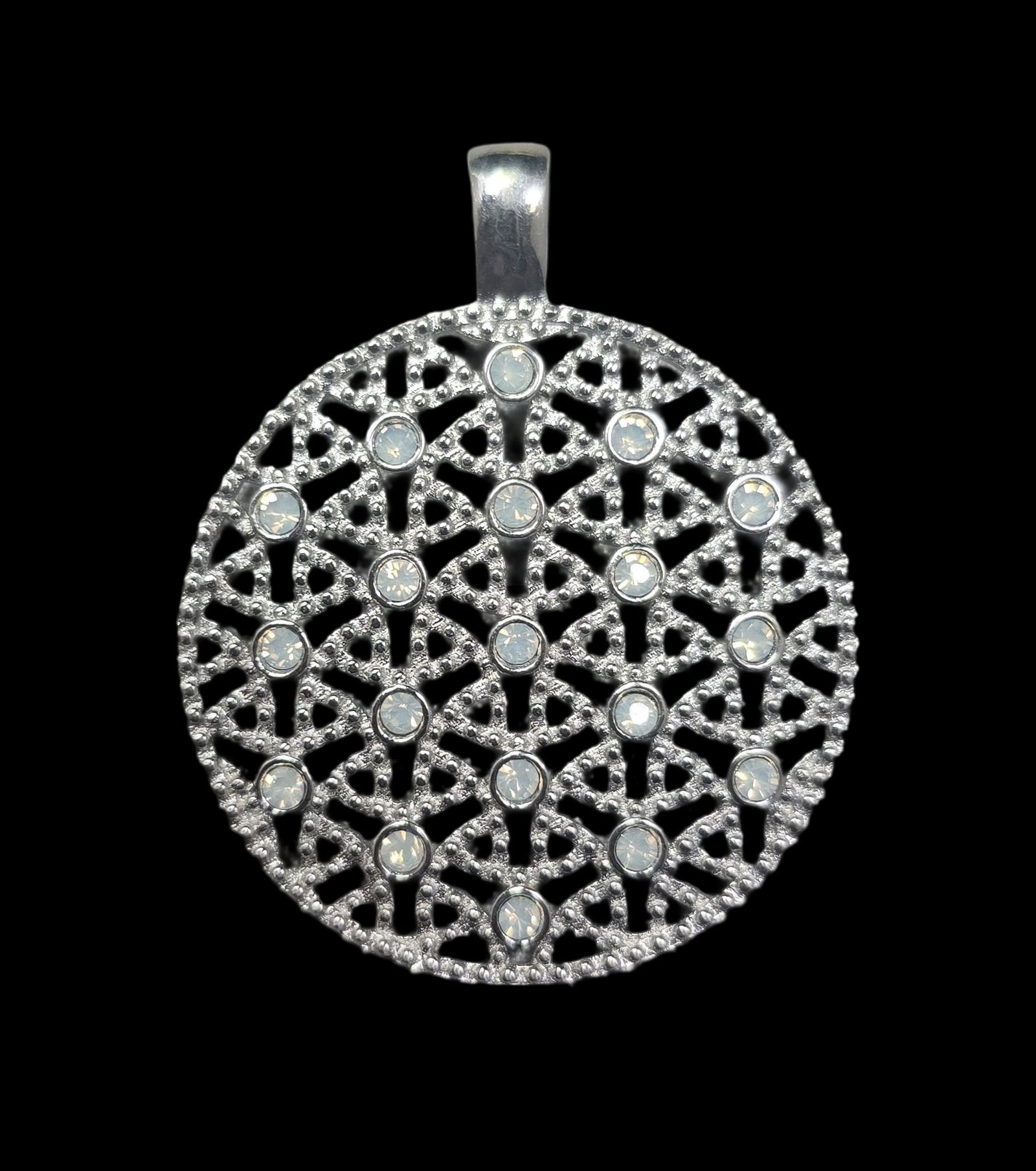 Unusual Vintage Sterling Silver & Moonstone Floral Pendant: Very good vintage condition with minor patina and wear according to age. Measures approx. 1 1/2" high and 1" wide and weighs ca. 6.5 grams. Marked for Sterling Silver. SHIPPING: We ship in-house and c