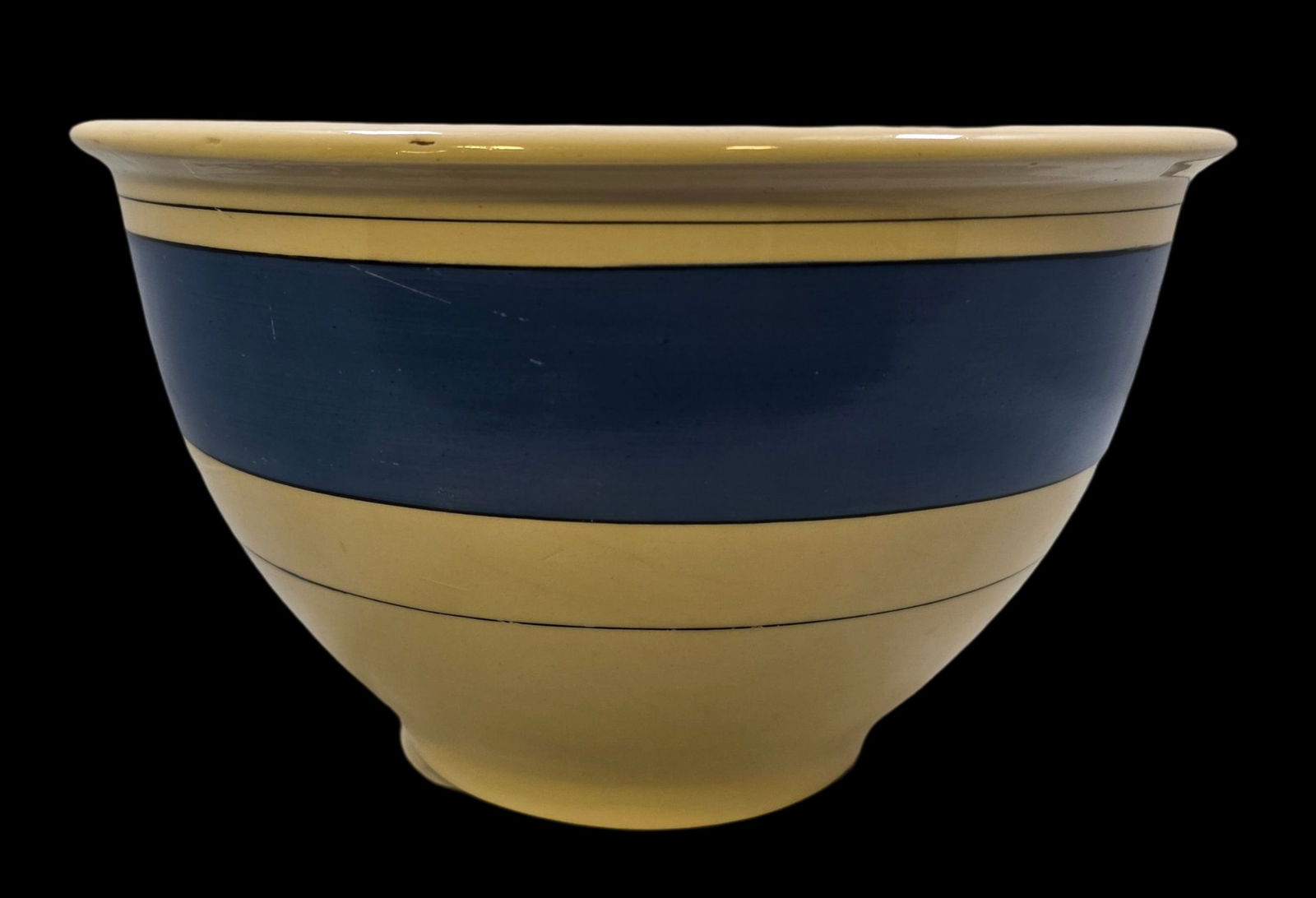 Vintage ROSEVILLE Art Pottery Tan & Blue Ceramic Mixing Bowl: Very good vintage condition with minor wear according to age, please see pictures. No cracks or repairs. Measures approx. 7" high and 12" wide. Marked.