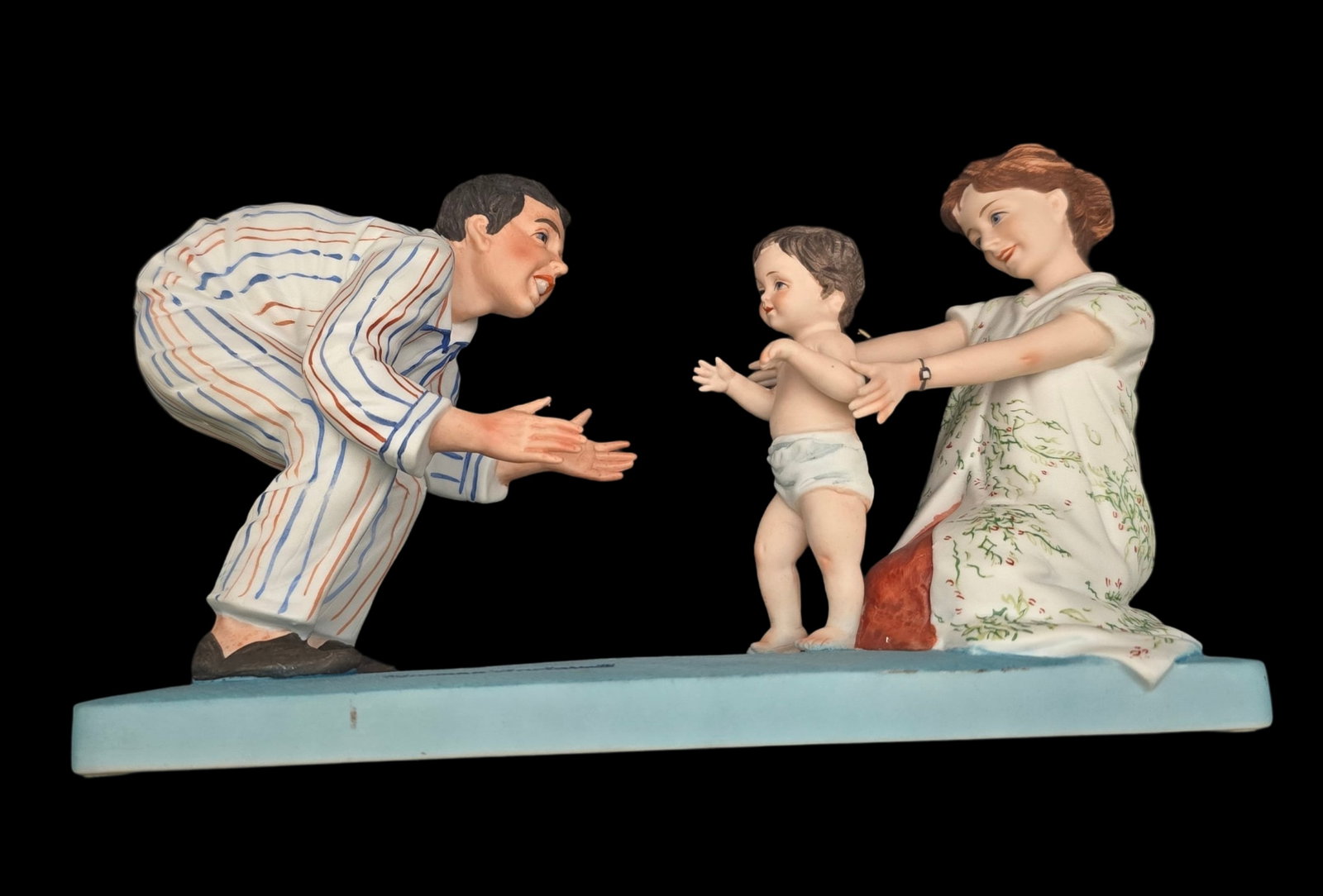 Vintage NORMAN ROCKWELL "Baby's First Step" Ceramic Figurine: Very good vintage condition with minor wear according to age, please see pictures. No cracks or repairs. Measures approx. 7" high x 5" wide. Marked.