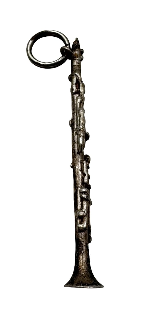 Charming Vintage Sterling Silver Clarinet Instrument Pendant Charm: Very good vintage condition with minor patina according to age. Measures approx. 2" long x 2/8" wide and weighs ca. 2.6 grams. Tested for Sterling Silver. SHIPPING: We ship in-house and charge a flat 