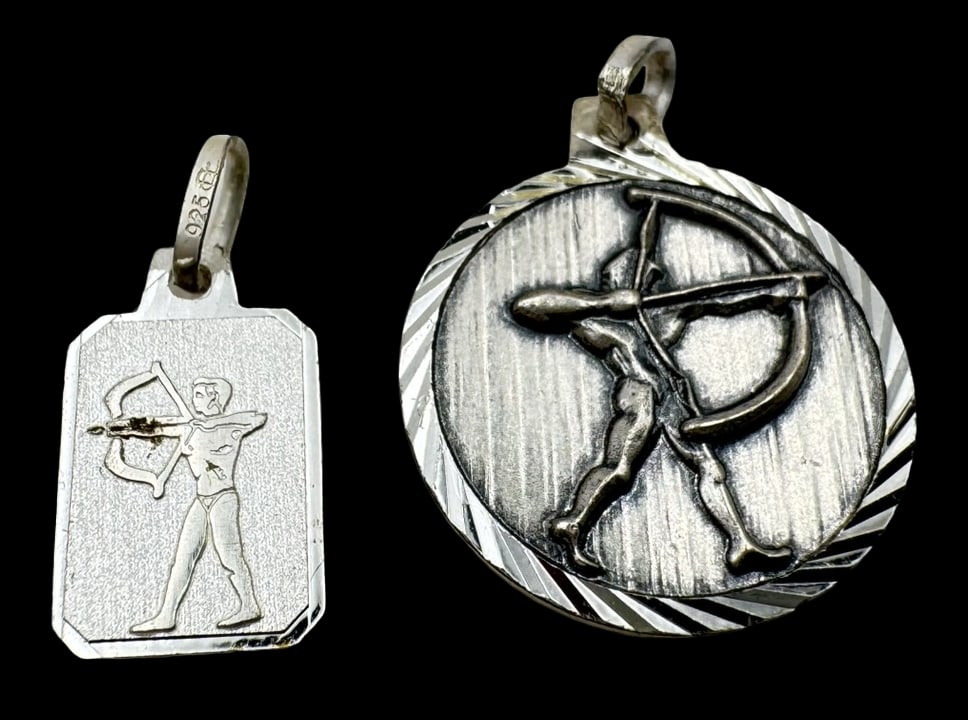 Pair of Vintage Sterling Silver Zodiac Pendant Charms - Sagittarius: Very good vintage condition with minor patina according to age. The largest piece measures approx. 3/8" in diameter and they jointly weigh ca. 2.4 grams. Marked for Sterling Silver. SHIPPING: We ship 