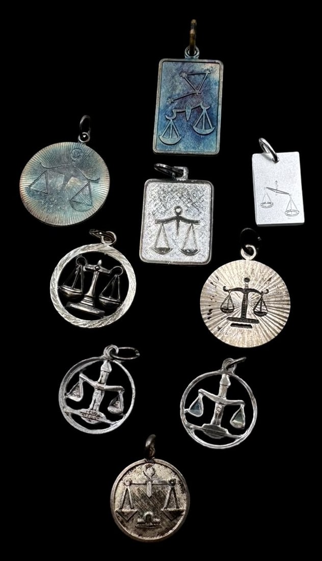 Lot of 9 Vintage Sterling Silver Zodiac Sign Pendant Charms - Libra: Very good vintage condition with minor patina according to age. The largest measures approx. 1" long x 1/2" wide and they jointly weigh ca. 17 grams. Marked for Sterling Silver. SHIPPING: We ship in-h
