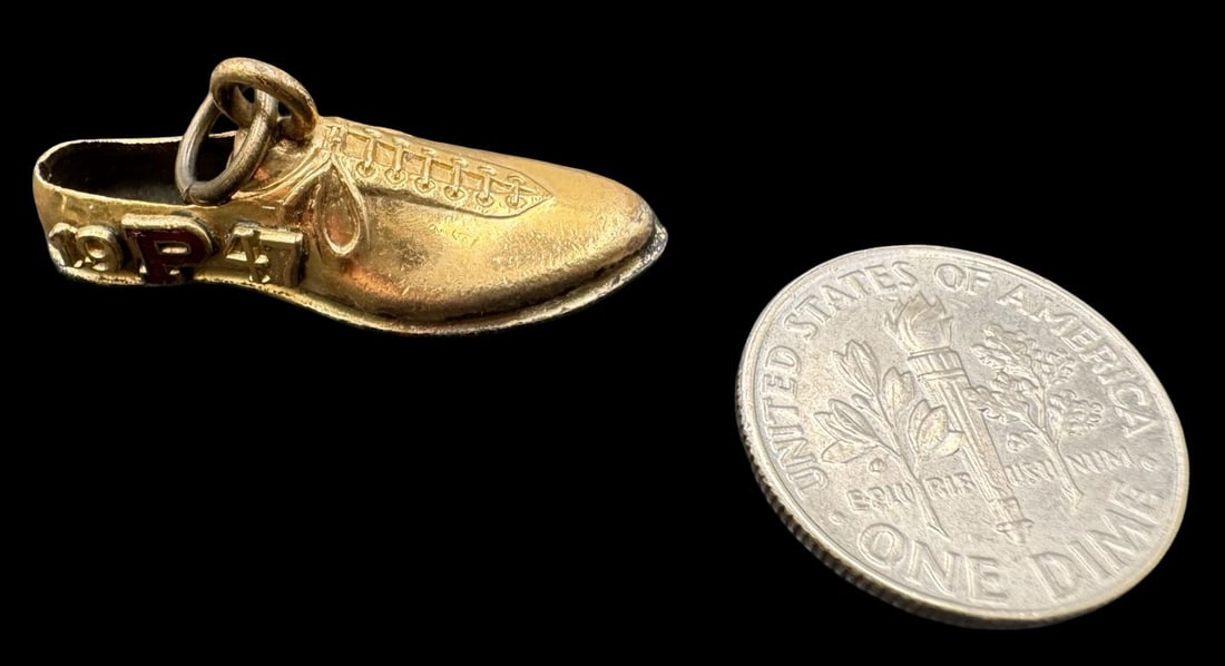 Antique 1947 10K Gold Plated College Football Shoe Pendant: Very good vintage condition with minor patina according to age. Measures approx. 1 1/4" long x 3/8" wide and weighs ca. 3.2 grams. Marked for 10K Gold Plated. SHIPPING: We ship in-house and charge a f