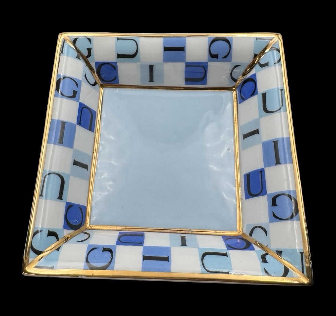 Stylish Vintage GUCCI Italy Blue, White & Gold Porcelain Ring Dish: Very good vintage condition; no chips, cracks, or repairs. Measures approx. 3 3/4" long x 3 3/4" wide x 1 " high. Marked "GUCCI".