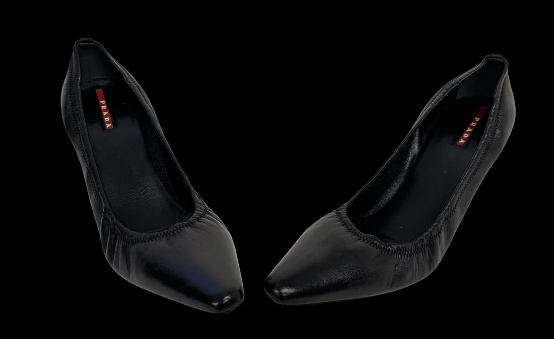 PRADA Heels Pointy Stiletto Pumps Black Buttersoft Calf Leather - Never Worn: PRADA Heels Pointy Stiletto Pumps Black Buttersoft Calf Leather known for their sleek design featuring and high heels. Very good pre-loved condition; never worn. Minimal signs of wear from storage. Si