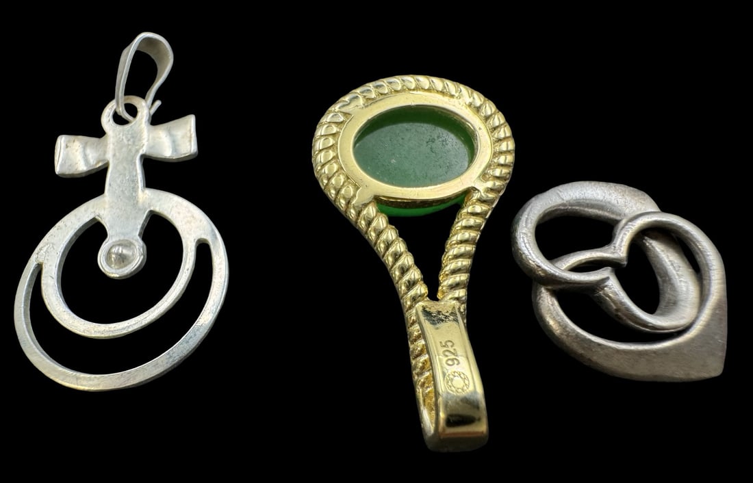 Lot of 3 Vintage Gilt Sterling Silver & 800 Silver Pendants: Very good vintage condition with minor patina according to age. The gilt one measures approx. 7/8 "long x 1/2" wide and they jointly weigh ca. 3.9 grams. Marked for silver.