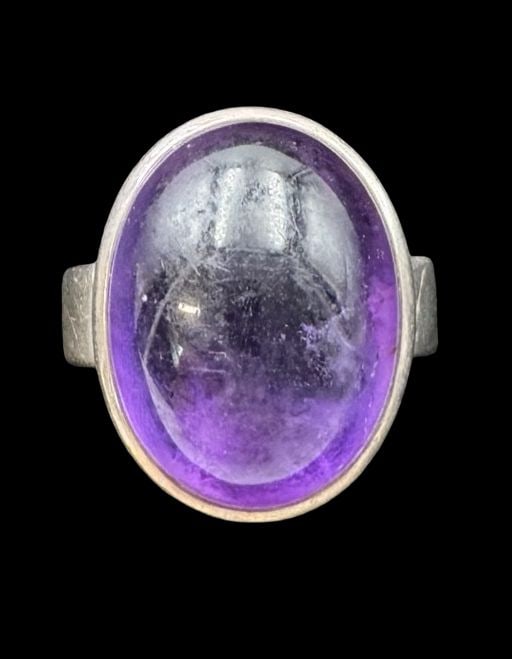 Stylish Vintage 1960s Mid-Century Sterling Silver & Amethyst Designer Ring: Very good vintage condition with minor patina according to age. Measures approx. 7/8" long x 5/8" wide and weighs ca. 11.1 grams. The ring is a size 7 1/2. Marked for Sterling Silver & Designer Signed