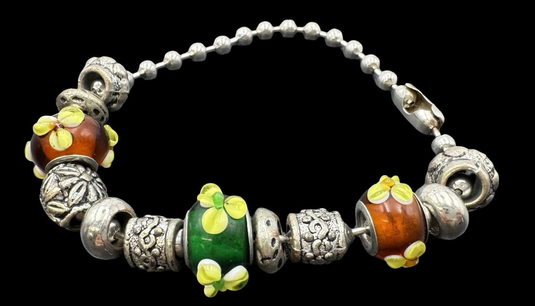Stylish Vintage European Pandora Style Art Glass Charm Bracelet: Very good vintage condition with minor patina according to age. Measures approx. 5/8" wide. The bracelet is approx. 9" long. SHIPPING: We ship in-house and charge a flat fee of $12 for any order of 5 