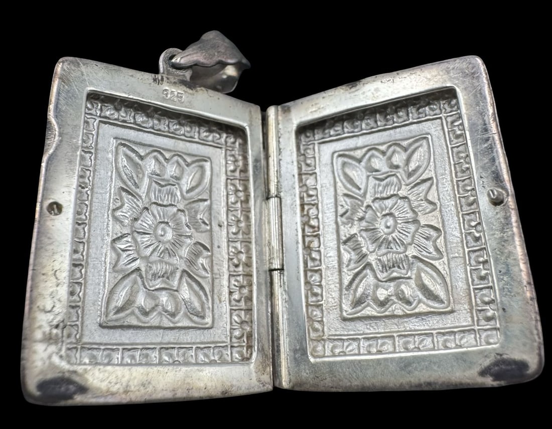 Ornate Vintage Sterling Silver Picture Locket Pendant: Very good vintage condition with minor patina according to age. Measures approx. 1 1/4" long x 7/8" wide and weighs ca. 7.7 grams. Marked for Sterling Silver. SHIPPING: We ship in-house and charge a f