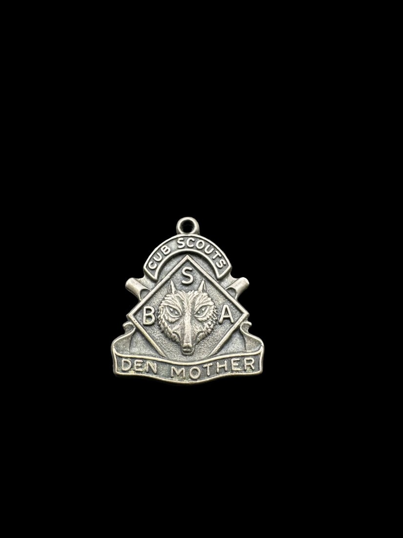 Ornate Vintage BSA Cub Scouts Den Mother Sterling Silver Pendant Charm: Very good vintage condition with minor patina according to age. Pendant measures approx. 3/4" long x 5/8" wide and weighs ca. 2.4 grams. Marked for Sterling Silver.