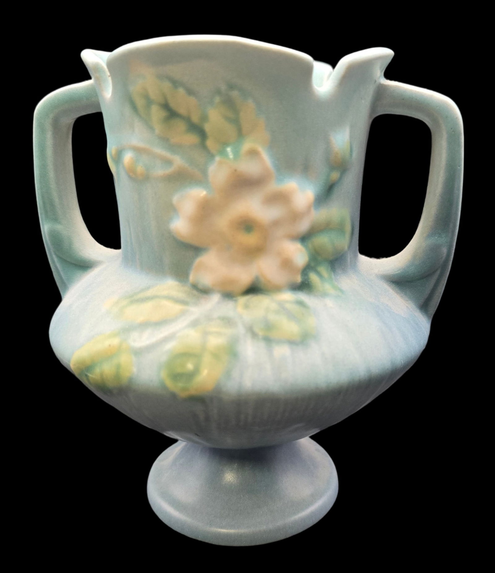 Vintage ROSEVILLE Art Pottery WHITE ROSE Blue Ceramic Vase: Very good vintage condition with minor wear according to age, please see pictures. No cracks or repairs. Measures approx. 6 1/2" high x 5 1/2" in diameter. Marked.