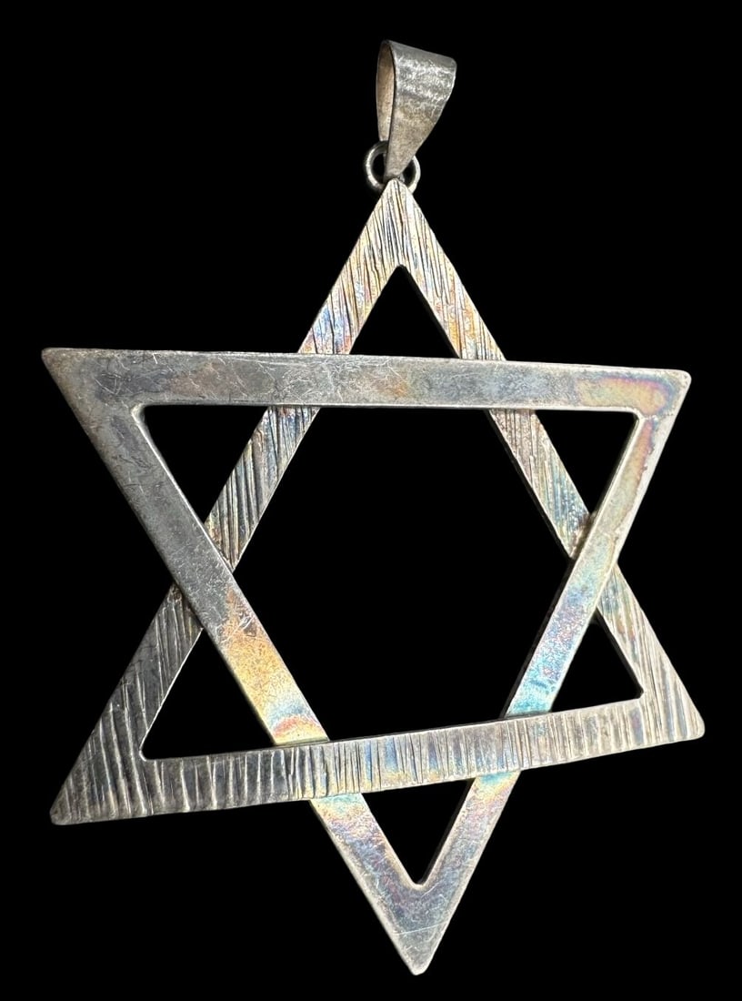 Vintage Israeli Jewish Sterling Silver Star of David Pendant: Very good vintage condition with minor patina according to age. Measures approx. 2 1/2" long x 1 7/8" wide and weighs ca. 6.6 grams. Marked for Sterling Silver & Israel.