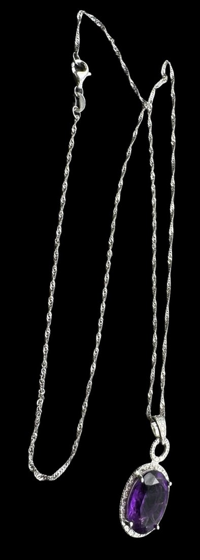 Vintage Sterling Silver Twisted Rope Necklace /w Purple Gemstone Pendant: Very good vintage condition with minor patina according to age. The pendant measures approx. 1 1/8" long x 1/2" wide and weighs ca. 3.9 grams. The necklace is approx. 18" long. Marked for Sterling Sil