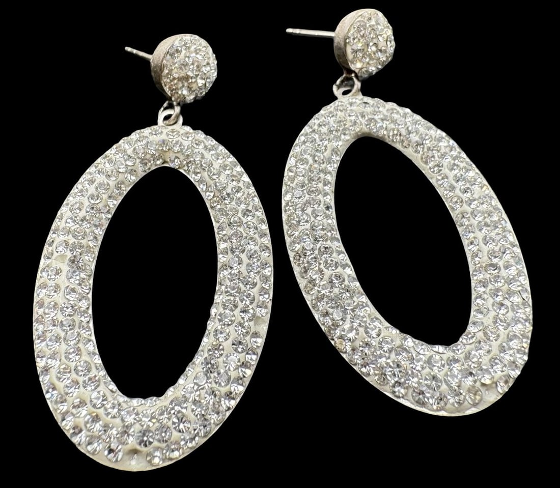 Vintage Sterling Silver Clear Rhinestone Cluster Drop Earrings: Very good vintage condition with minor patina according to age. Each measures approx. 2 1/8" long x 1" wide and they jointly weigh ca. 7.8 grams. Marked for Sterling Silver.