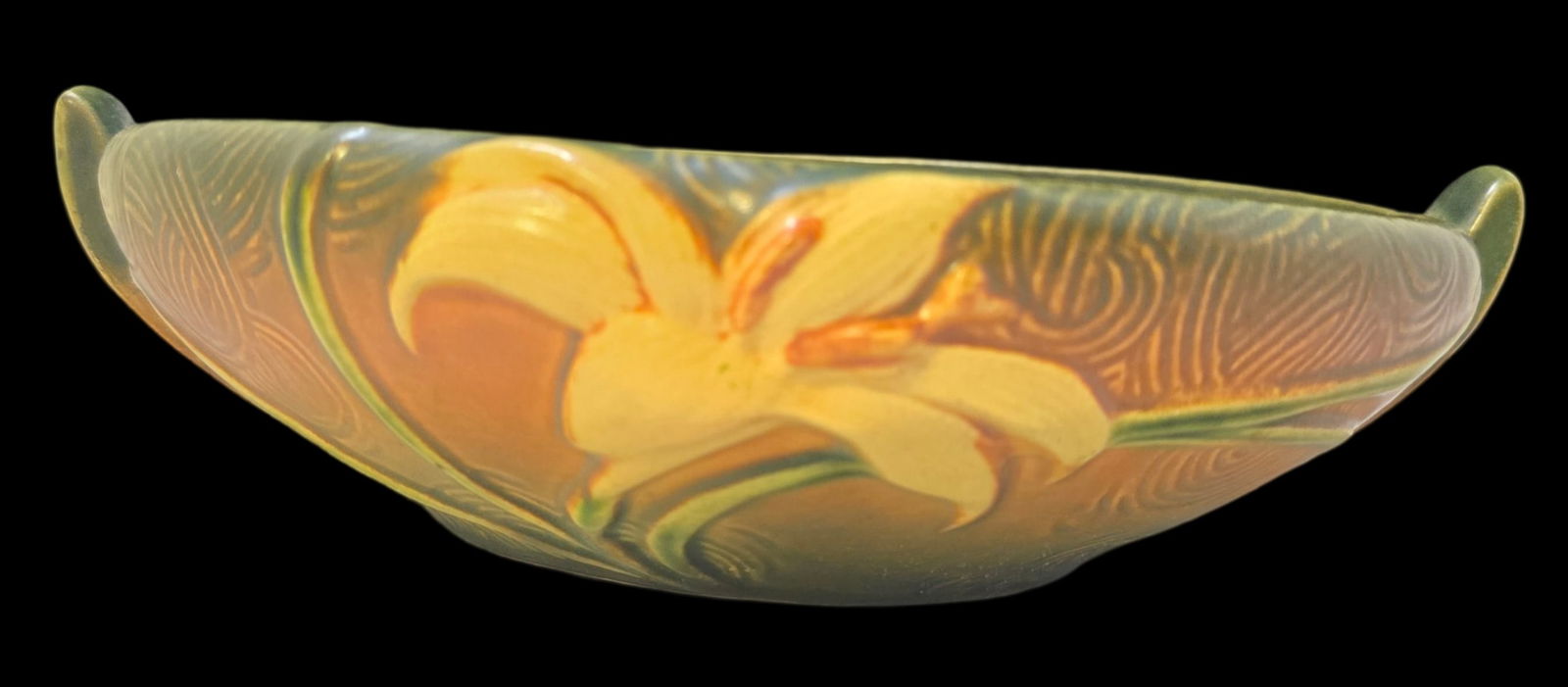 Vintage ROSEVILLE Art Pottery ZEPHYR LILY Green & Brown Ceramic Bowl: Very good vintage condition with minor wear according to age, please see pictures. No cracks or repairs. Measures approx. 2 1/2" high x 10" wide Marked.