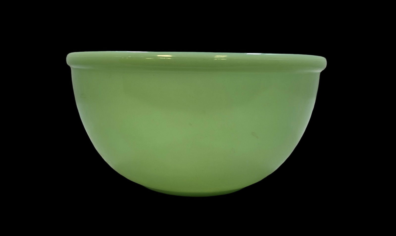 Vintage FIRE KING Jadeite Glass Mixing Bowl: Very good vintage condition with minor wear according to age, please see pictures. No cracks or repairs. Measures approx. 4" high x 7" wide. Marked.