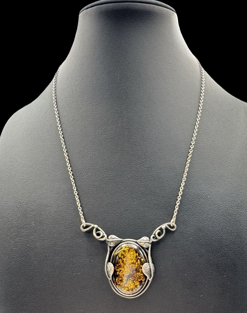 Ornate Vintage Sterling Silver Necklace /w Amber Pendant: Very good vintage condition with minor patina according to age. The pendant measures approx. 1 1/2" long x 2" wide & the piece weighs ca. 9.9 grams in total. The necklace is approx. 18" long. Marked f