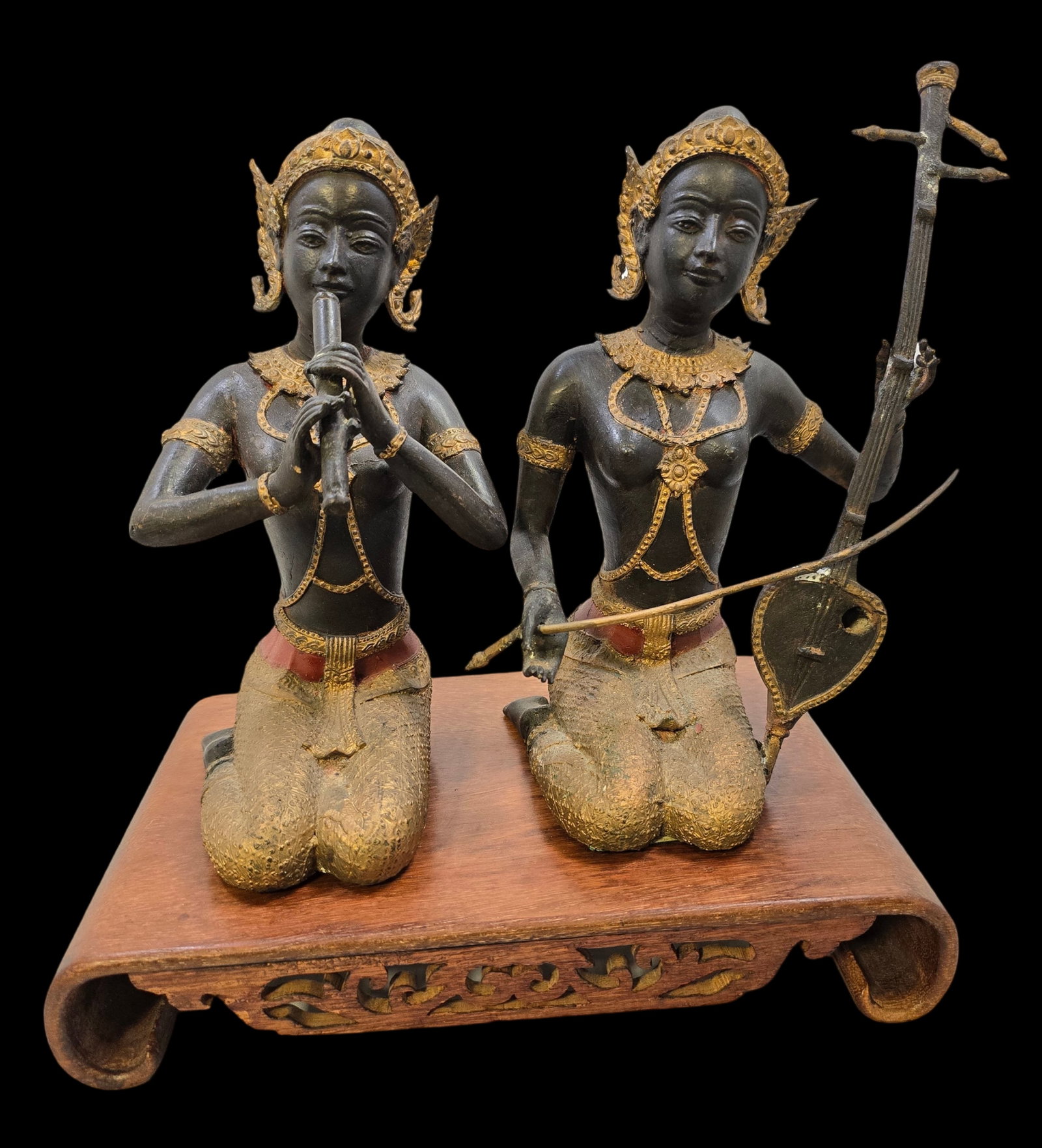 Pair of Vintage Handpainted Thai Cast Metal Figurines: Very good vintage condition with some patina according to age, please see pictures. Measures approx. 13" high x 12" wide.