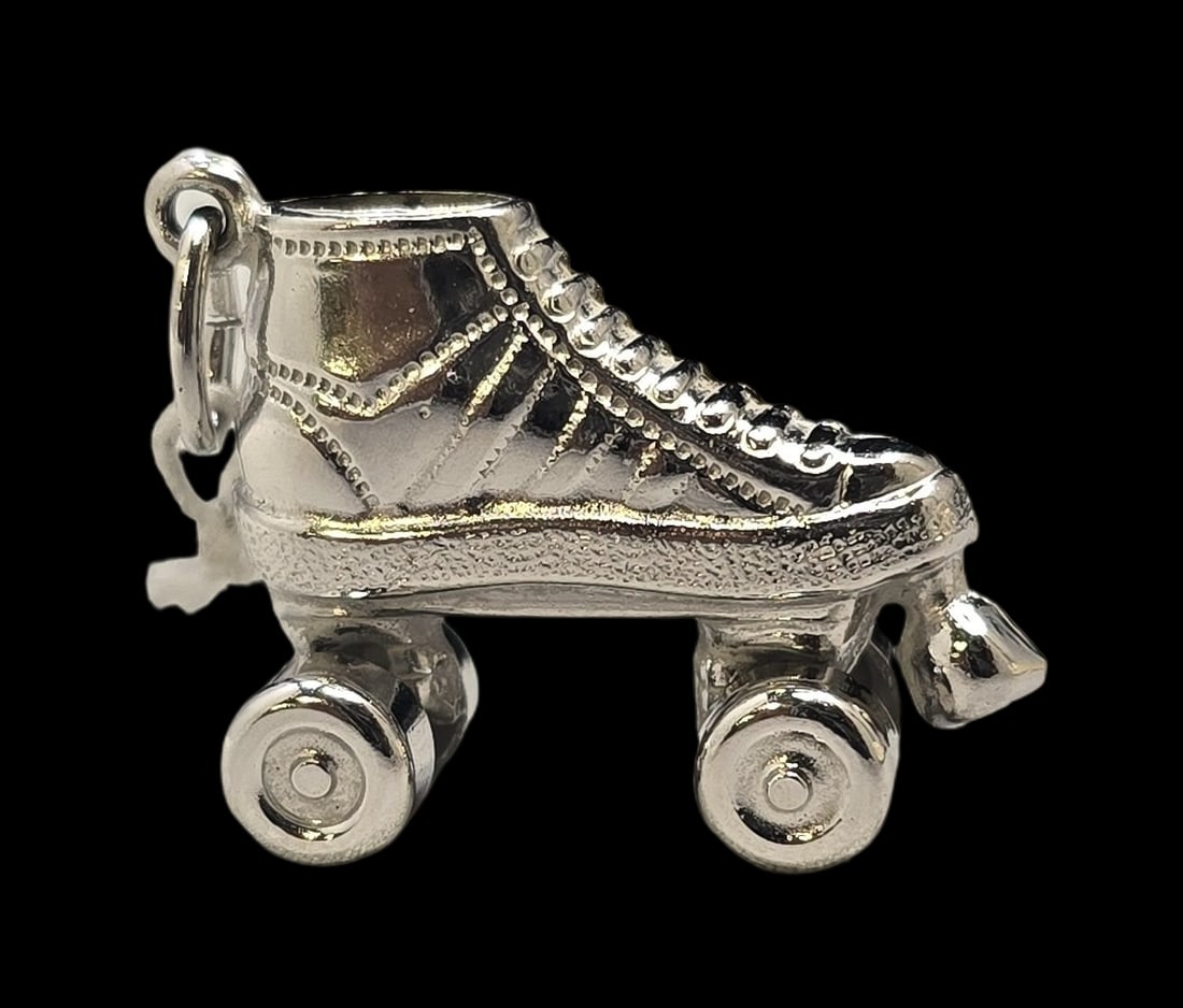 Very Cool Vintage 1980s Sterling Silver Roller Skate Pendant Charm: Very good condition pendant. Measures approx. 1" high. 1" wide and weighs ca. 2 grams SHIPPING: We ship in-house and charge a flat fee of $12 for any order of 5 small items (rings, necklaces, bracelet