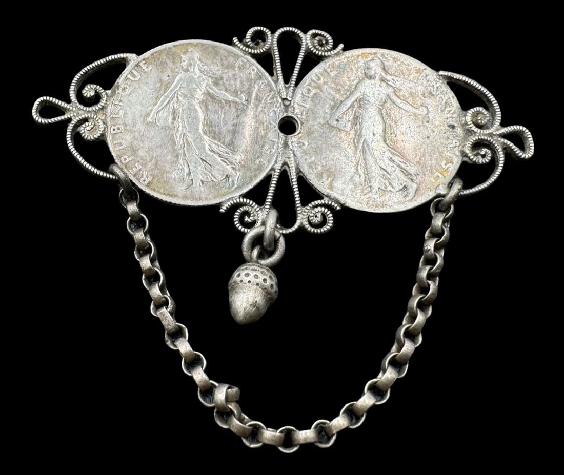 Ornate Antique Early 1900s French 50 Centimes Silver Coin Brooch: Very good vintage condition with minor patina according to age. Measures approx. 2 " long and 1 5/8" wide & weighs ca. 8 grams. Missing Pin. Tested for a minimum of 800 Silver; the coins are 835 (83.5