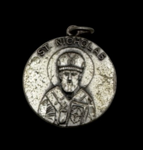 Vintage Saint Nicholas Sterling Silver Christian Pendant Charm: Very good vintage condition with minor patina according to age. Measures approx. 3/4" in diameter and weighs ca. 4.2 grams. Marked for Sterling Silver. SHIPPING: We ship in-house and charge a flat fee