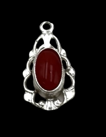 Charming Vintage European 800 Silver Pendant with Red Gemstone: Very good vintage condition with minor patina according to age. Measures approx. 3/4" long x 2/8" wide and weighs ca. 1.1 grams. Tested for 800 (80%) silver. SHIPPING: We ship in-house and charge a fl