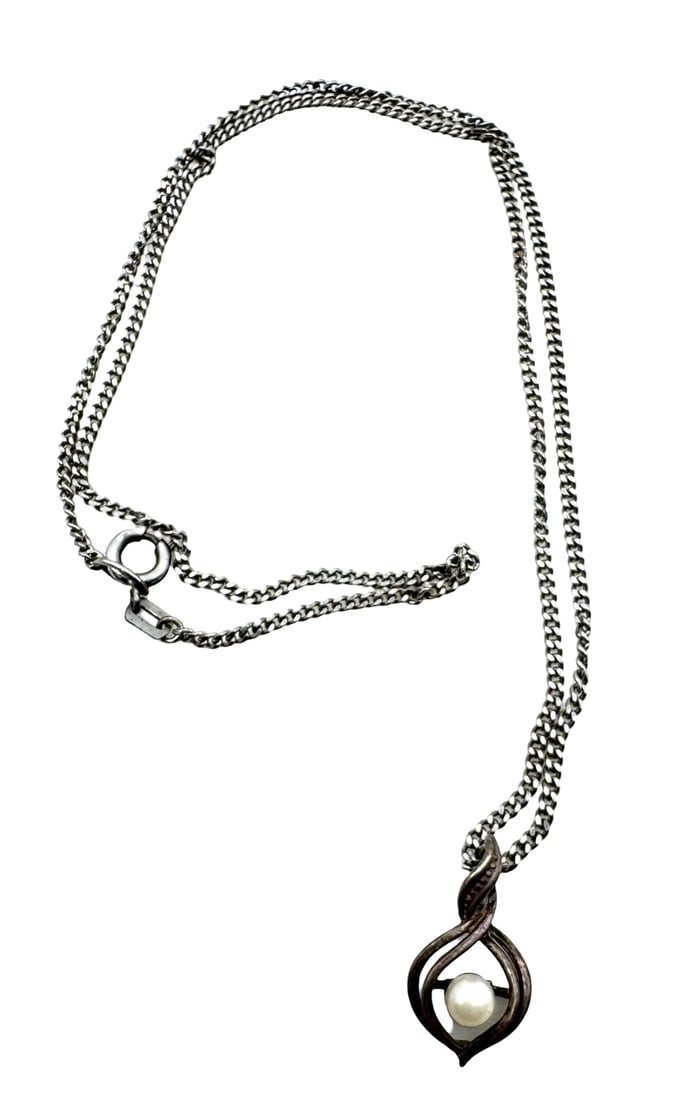 Charming Vintage Sterling Silver & Pearl Pendant Necklace: Very good vintage condition with minor patina according to age. The necklace measures approx. 17" long and the pendant measures approx. 3/4" long x 2/8" wide and they jointly weigh ca. 4.2 grams. Mark