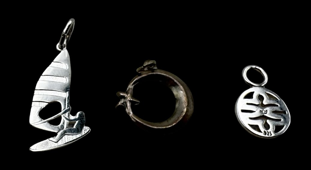 Charming Vintage Set of 3 Sterling Silver Pendant Charms: Very good vintage condition with minor patina according to age. The largest piece measures approx. 1" long x 1/2" wide and they jointly weigh ca. 2.3 grams. Marked for Sterling Silver. SHIPPING: We sh