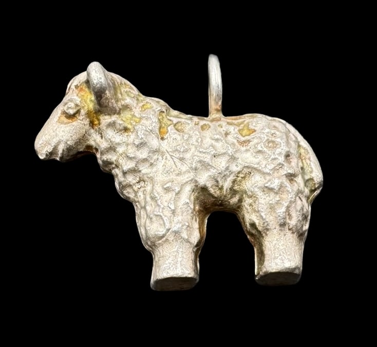 Vintage Sterling Silver Sheep Pendant Charm: Very good vintage condition with minor patina according to age. Pendant measures approx. 1" long and 3/4" wide & weighs ca. 10.8 grams. Tested for Sterling Silver. SHIPPING: We ship in-house and charg