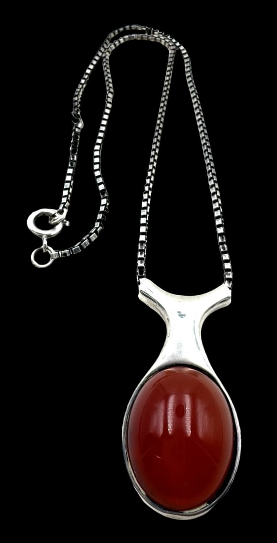 Stunning Vintage Mid-Century Modern FRANZ SCHEURLE Germany Sterling Silver & Carnelian Pendant: Very good vintage condition with minor patina according to age. The necklace measures approx. 16" long. The pendant measures approx. 1 1/2" long x 3/4" wide and weighs ca. 23 grams. Marked for Sterlin