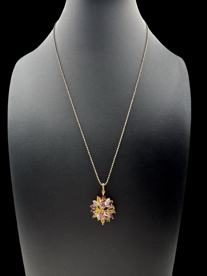 Vintage Gilt Sterling Silver & Multicolor Rhinestone Pendant: Very good vintage condition with minor patina according to age. Pendant measures approx. 1 1/4" long and 3/4"wide; necklace is approx. 19" long & total weight is ca. 7.7 grams. Marked for Sterling Sil