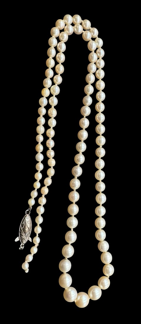 Vintage Pearl Necklace /w Sterling Silver Clasp: Very good vintage condition with minor patina according to age. Measures approx. 21" long and 1/4"wide. SHIPPING: We ship in-house and charge a flat fee of $12 for any order of 5 small items (rings, n