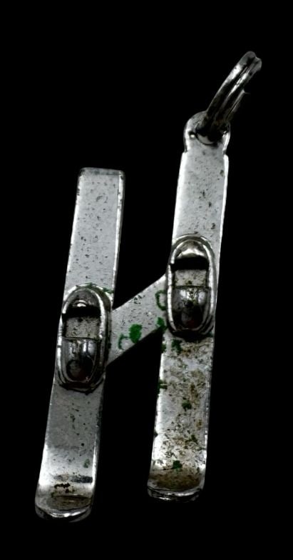 Vintage Sterling Silver Skiing / Skis Pendant Charm: Very good vintage condition with minor patina according to age. Measures approx. 1 1/4" long x 3/8" wide and weighs ca. 1.3 grams. Marked for Sterling Silver. SHIPPING: We ship in-house and charge a f