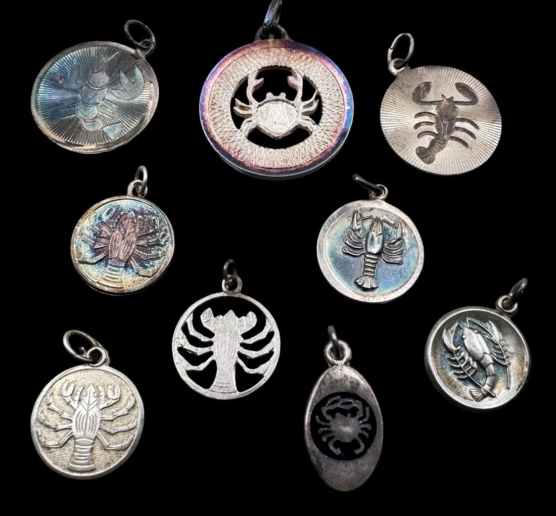 Lot of 9 Vintage Sterling Silver Zodiac Sign Pendant Charms - Cancer: Very good vintage condition with minor patina according to age. The largest measures approx. 1" in diameter and they jointly weigh ca. 17.7 grams. Marked for Sterling Silver. SHIPPING: We ship in-hous