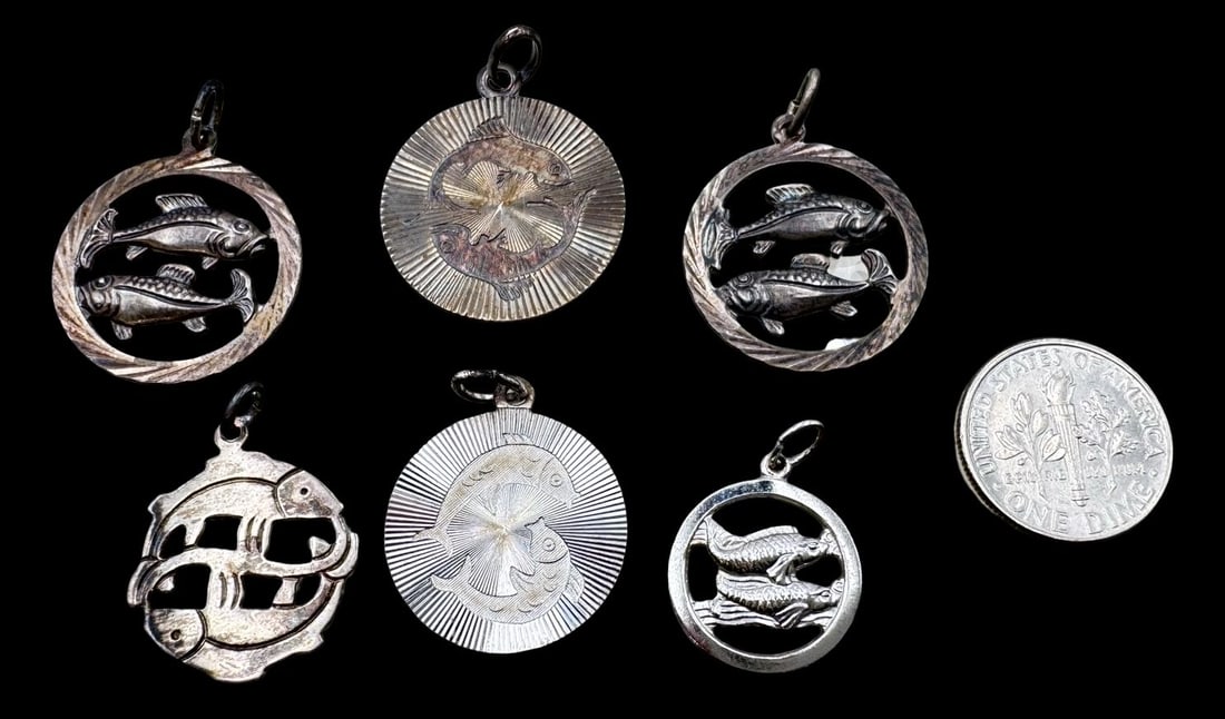 Lot of 6 Vintage Sterling Silver Zodiac Sign Pendant Charms - Pisces: Very good vintage condition with minor patina according to age. The largest measures approx. 7/8" in diameter and they jointly weigh ca. 13 grams. Marked for Sterling Silver. SHIPPING: We ship in-hous
