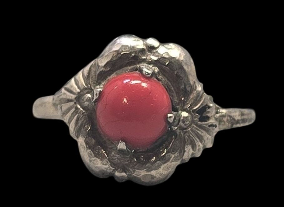 Beautiful Vintage Sterling Silver & Red Gemstone Ring: Very good vintage condition with minor patina and wear according to age. The ring is a size 3 and weighs ca. 1 gram. Marked for Sterling Silver. SHIPPING: We ship in-house and charge a flat fee of $12