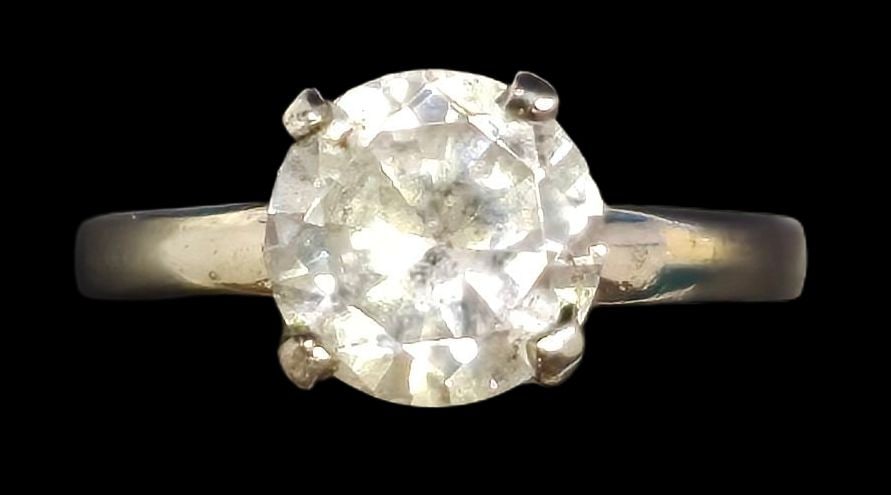 Vintage Sterling Silver & Solitaire Gemstone Anniversary Ring: Very good vintage condition with minor patina and wear according to age. The ring is a size 6 and weighs ca. 2.5 grams. Marked for Sterling Silver. SHIPPING: We ship in-house and charge a flat fee of