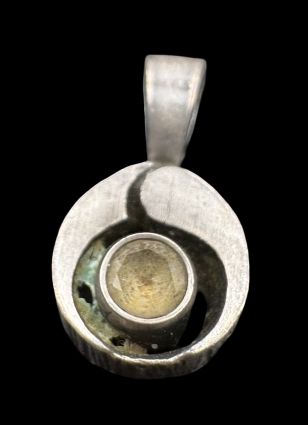 Vintage Mid-Century Modern Finnish Sterling Silver & Rock Crystal Designer Pendant Charm: Very good vintage condition with minor patina according to age. Measures approx. 1/2" long x 1/4" wide and weighs ca. 0.8 grams. Marked for Sterling Silver.& signed. SHIPPING: We ship in-house and cha