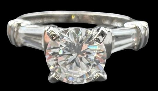 Vintage Sterling Silver & Clear Rhinestone Ring: Very good vintage condition with minor patina according to age. Measures approx. 1/4" long and 1/4" wide and weighs ca. 2.4 grams. The ring is a size 5. Marked for Sterling Silver SHIPPING: We ship in