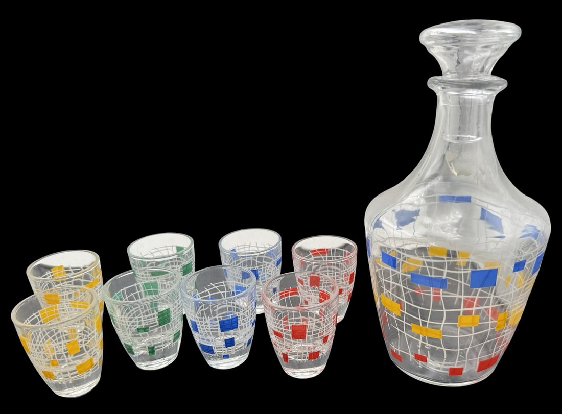 Vintage Mid-Century French Art Glass Liquor Decanter & Shot Glass Set: Very good vintage condition. No chips, cracks, or repairs. Decanter measures approx. 7" high x 4" wide. Shot glasses measure approx. 2" high x 1 5/8" wide. Marked "France".