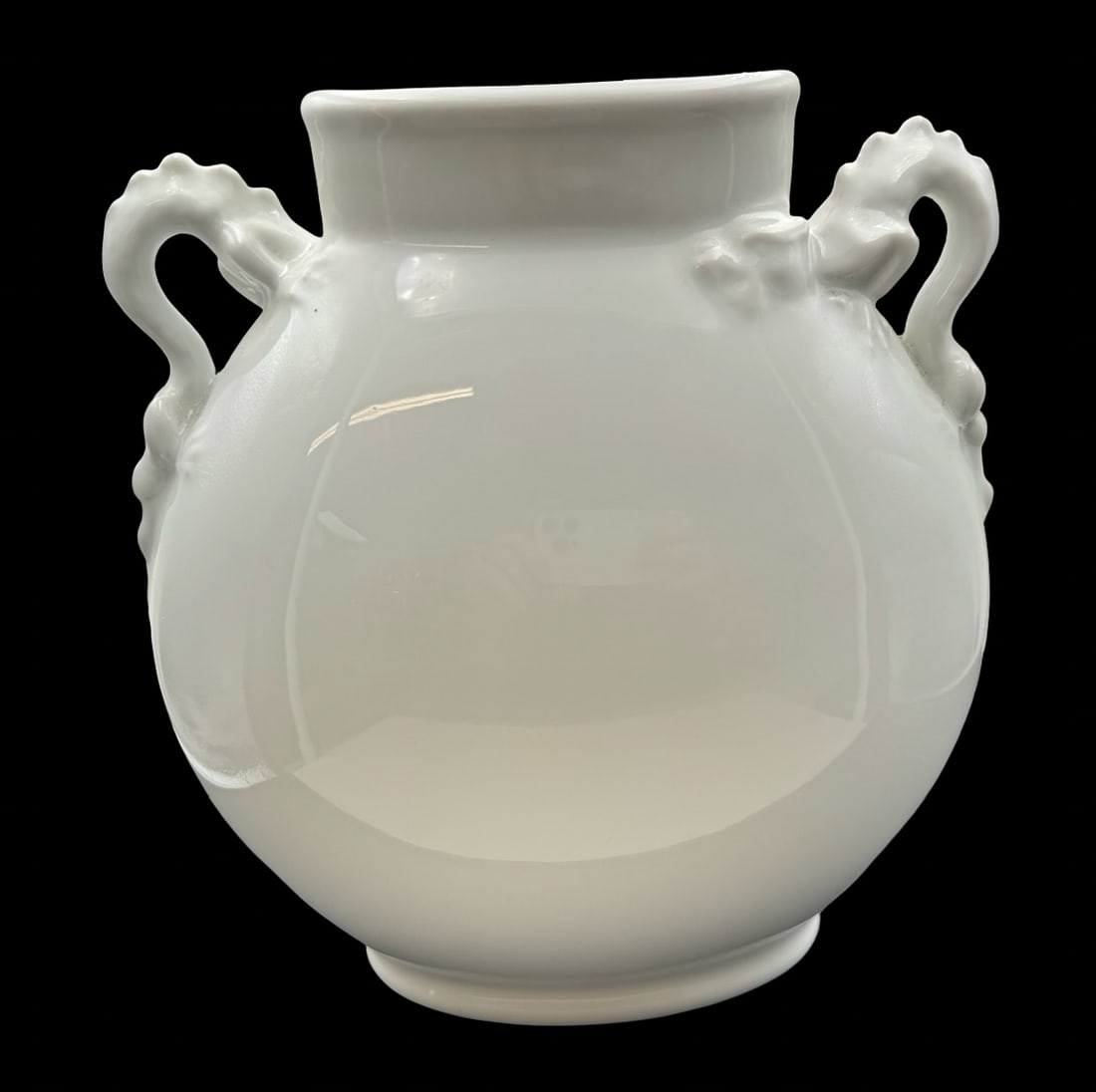 Rare Vintage GIRAUD LIMOGES France White Porcelain Dragon Handle Vase: Giraud Limoges vase made from white Blanc-de-Chine porcelain with sculptural dragon handles. Very good vintage condition. No chips, cracks or repairs. Measures approx. 8" high x 8" wide. Signed GIRAUD