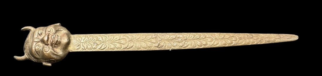 Very Unusual Vintage Cast Metal Smiling Devil / Horned Man Letter Opener: Very good vintage condition. Measures approx. 8 3/4" long x 1 3/8" wide.