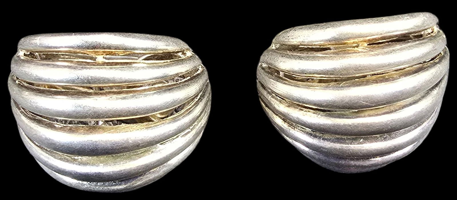 Large Vintage Mid-Century Sterling Silver Clip-On Earrings: Very good vintage condition with minor patina according to age. Each measures approx. 1" wide and they jointly weigh ca. 7 grams. Tested for Sterling Silver. SHIPPING: We ship in-house and charge a fl